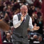 
              Texas A&M head coach Buzz Williams reacts after his team made a 3-point basket against Arkansas during the second half of an NCAA college basketball game Saturday, Jan. 8, 2022, in College Station, Texas. (AP Photo/Sam Craft)
            