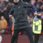 
              Liverpool's manager Jurgen Klopp celebrates at the end of an English Premier League soccer match between Liverpool and Brentford at Anfield in Liverpool, England, Sunday, Jan. 16, 2022. (AP Photo/Jon Super)
            