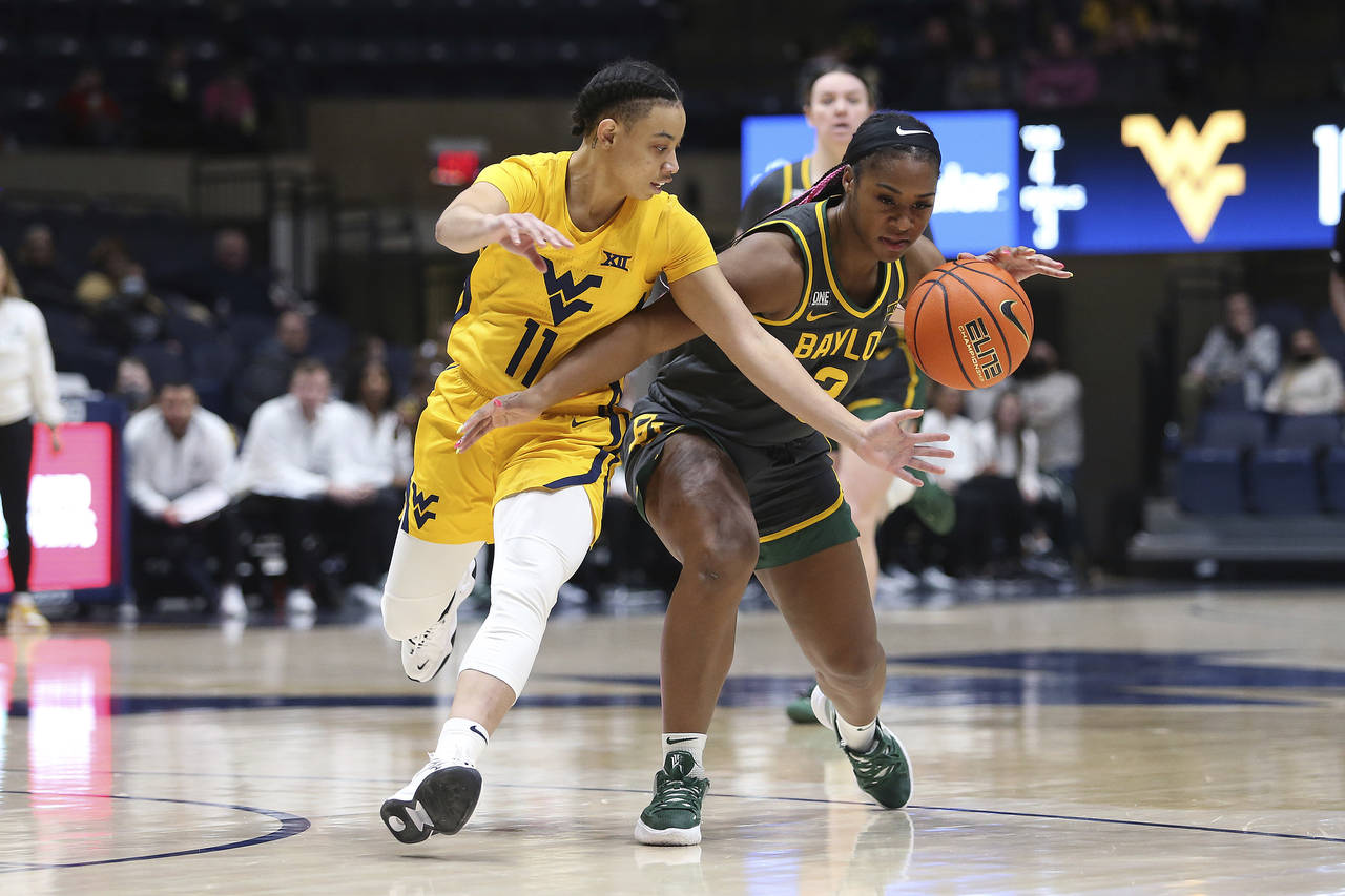 Baylor guard Jordan Lewis (3) is defended by West Virginia guard Ja'Naiya Quinerly (11) during the ...