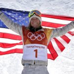 
              FILE - Jamie Anderson, of the United States, celebrates winning gold after the women's slopestyle final at Phoenix Snow Park at the 2018 Winter Olympics in Pyeongchang, South Korea, Monday, Feb. 12, 2018. Still bothering many of the riders was the way the slopestyle contests went down at the Pyeongchang Games four years ago.  (AP Photo/Lee Jin-man, File)
            