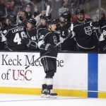 
              Los Angeles Kings center Trevor Moore (12) is congratulated for his goal during the first period of the team's NHL hockey game against the Philadelphia Flyers on Saturday, Jan. 1, 2022, in Los Angeles. (AP Photo/Kyusung Gong)
            