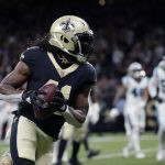 
              New Orleans Saints running back Alvin Kamara (41) carries on a touchdown reception in the second half of an NFL football game against the Carolina Panthers in New Orleans, Sunday, Jan. 2, 2022. (AP Photo/Derick Hingle)
            