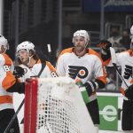 
              Philadelphia Flyers celebrate a goal by left wing Joel Farabee (86) during the first period of an NHL hockey game against the Los Angeles Kings on Saturday, Jan. 1, 2022, in Los Angeles. (AP Photo/Kyusung Gong)
            