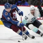 
              Colorado Avalanche defenseman Cale Makar, left, collects the puck as Seattle Kraken right wing Joonas Donskoi pursues in the second period of an NHL hockey game Monday, Jan. 10, 2022, in Denver. (AP Photo/David Zalubowski)
            
