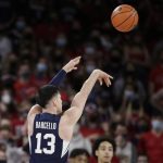 
              BYU guard Alex Barcello shoots during the first half of an NCAA college basketball game against Gonzaga, Thursday, Jan. 13, 2022, in Spokane, Wash. (AP Photo/Young Kwak)
            