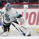 
              Seattle Kraken goaltender Philipp Grubauer stops a shot in the second period of an NHL hockey game against the Colorado Avalanche, Monday, Jan. 10, 2022, in Denver. (AP Photo/David Zalubowski)
            