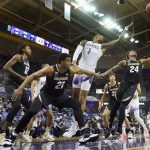 
              Washington forward Nate Roberts (1) and Colorado guard Elijah Parquet (24) leap for a rebound during the first half of an NCAA college basketball game, Thursday, Jan. 27, 2022, in Seattle. (AP Photo/Ted S. Warren)
            