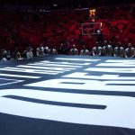 
              Miami Heat players hold a banner reading "I Have a Dream" in honor of Martin Luther King Jr. before an NBA basketball game against the Toronto Raptors, Monday, Jan. 17, 2022, in Miami. (AP Photo/Lynne Sladky)
            