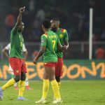 
              Cameroon's Vincent Aboubakar, left, celebrates scoring his side's second goal during the African Cup of Nations 2022 round of 16 soccer match between Cameroon and Comoros at the Olembe stadium in Yaounde, Cameroon, Monday, Jan. 24, 2022. (AP Photo/Themba Hadebe)
            