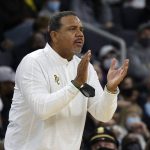 
              Providence head coach Ed Cooley encourages his team during the first half of an NCAA college basketball game against Butler, Sunday, Jan. 23, 2022, in Providence, R.I. (AP Photo/Mary Schwalm)
            