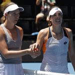 
              Danielle Collins, left, of the U.S. is congratulated by Alize Cornet of France following their quarterfinal match at the Australian Open tennis championships in Melbourne, Australia, Wednesday, Jan. 26, 2022. (AP Photo/Hamish Blair)
            