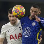 
              Chelsea's Hakim Ziyech, right, jumps for the ball with Tottenham's Ben Davies during the English Premier League soccer match between Chelsea and Tottenham Hotspur at Stamford Bridge stadium in London, England, Sunday, Jan. 23, 2022. (AP Photo/Kirsty Wigglesworth)
            