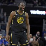 
              Golden State Warriors forward Draymond Green (23) reacts toward the Miami Heat bench after shooting a 3-point basket during the second half of an NBA basketball game in San Francisco, Monday, Jan. 3, 2022. (AP Photo/Jeff Chiu)
            