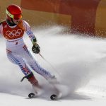 
              FILE - Mikaela Shiffrin, of the United States, skies into the finish area after winning the gold medal in the Women's Giant Slalom at the 2018 Winter Olympics in Pyeongchang, South Korea, Feb. 15, 2018. Winter Olympians in outdoor sports such as Alpine skiing or snowboarding say the weather can be a key factor in success or failure. (AP Photo/Morry Gash, File)
            