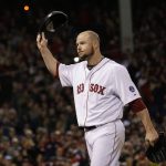 
              FILE - Boston Red Sox starting pitcher Jon Lester acknowledges the crowd as he leaves the game during the eighth inning of Game 1 of baseball's World Series against the St. Louis Cardinals Wednesday, Oct. 23, 2013, in Boston. Lester, a durable left-hander who won three World Series titles during 16 years in the majors, has announced his retirement. Lester, who turned 38 on Friday, Jan. 7, 2022, finishes with a 200-117 record and a 3.66 ERA in 452 career games, including 451 starts. He also has been a reliable postseason performer, compiling a 2.51 ERA in 26 appearances. (AP Photo/David J. Phillip, File)
            