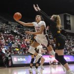 
              Stanford guard Haley Jones (30) shoots against Arizona State guard Sydney Erikstrup during the second half of an NCAA college basketball game in Stanford, Calif., Friday, Jan. 28, 2022. (AP Photo/Jeff Chiu)
            