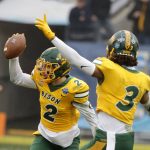 
              North Dakota State safety Dawson Weber (2) celebrates his interception against Montana State with teammate Jasir Cox (3) during the first half of the FCS Championship NCAA college football game in Frisco, Texas, Saturday, Jan. 8, 2022. (AP Photo/Michael Ainsworth)
            