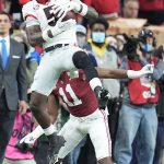 
              Georgia's Kelee Ringo returns an interception for a touchdown during the second half of the College Football Playoff championship football game against Alabama Monday, Jan. 10, 2022, in Indianapolis. (AP Photo/Darron Cummings)
            