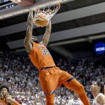 
              Auburn guard Devan Cambridge (35) dunks for two points against Alabama during the first half of an NCAA college basketball game, Tuesday, Jan. 11, 2022, in Tuscaloosa, Ala. (AP Photo/Vasha Hunt)
            