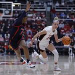 
              Arizona forward Koi Love (5) defends against Stanford guard Lexie Hull (12) who dribbles toward the basket during the first half of an NCAA college basketball game Sunday, Jan. 30, 2022, in Stanford, Calif. (AP Photo/Josie Lepe)
            