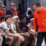
              Illinois head coach Brad Underwood, right, reacts as he talks to his players during the first half of an NCAA college basketball game against Northwestern in Evanston, Ill., Saturday, Jan. 29, 2022. Illinois won 59-56.(AP Photo/Nam Y. Huh)
            