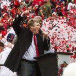 
              Georgia coach Kirby Smart cheers on the crowd during the NCAA college football champions victory celebration at Stanford Stadium in Athens, Ga.,, Saturday, Jan. 15, 2022. (Steve Schaefer/Atlanta Journal-Constitution via AP)
            