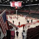 
              A few Stanford guests watch in warm ups in an empty arena before game an NCAA college basketball game against Southern California, Tuesday, Jan. 11, 2022, in Stanford, Calif. (AP Photo/Josie Lepe)
            