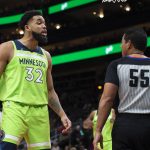
              Minnesota Timberwolves center Karl-Anthony Towns (32) talks to referee Bill Kennedy during the first half of the team's NBA basketball game against the Atlanta Hawks on Wednesday, Jan. 19, 2022, in Atlanta. (AP Photo/Hakim Wright Sr.)
            