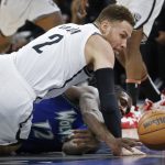 
              Brooklyn Nets center Blake Griffin (2) and Minnesota Timberwolves forward Taurean Prince vie for the ball in the second quarter of an NBA basketball game Sunday, Jan. 23, 2022, in Minneapolis. (AP Photo/Bruce Kluckhohn)
            