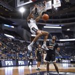 
              Connecticut's Jordan Hawkins dunks during the second half of the team's NCAA college basketball game against Butler, Tuesday, Jan. 18, 2022, in Hartford, Conn. (AP Photo/Jessica Hill)
            