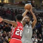 
              RETRANSMISSION TO REMOVE SCORE -  Brooklyn Nets' Kevin Durant shoots over Chicago Bulls' Alfonzo McKinnie during the first half of an NBA basketball game Wednesday, Jan. 12, 2022, in Chicago. (AP Photo/Charles Rex Arbogast)
            