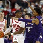 
              Ohio State forward E.J. Liddell (3) works against Northwestern guard Julian Roper, right, during the first half of an NCAA college basketball game in Columbus, Ohio, Sunday, Jan. 9, 2022. (AP Photo/Paul Vernon)
            