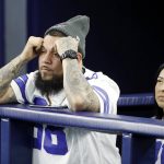 
              Dallas Cowboys fans react during the second half of an NFL wild-card playoff football game between the Cowboys and the San Francisco 49ers in Arlington, Texas, Sunday, Jan. 16, 2022. (AP Photo/Roger Steinman)
            