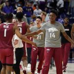 
              Arkansas celebrates after defeating LSU in an NCAA college basketball game in Baton Rouge, La., Saturday, Jan. 15, 2022. Arkansas won 65-58. (AP Photo/Gerald Herbert)
            
