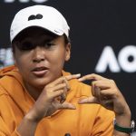 
              Japan's Naomi Osaka gestures during a press conference ahead of the Australian Open tennis championships in Melbourne, Australia, Saturday, Jan. 15, 2022. (AP Photo/Simon Baker)
            
