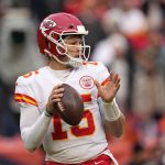 
              Kansas City Chiefs quarterback Patrick Mahomes (15) passes against the Denver Broncos during the first half of an NFL football game Saturday, Jan. 8, 2022, in Denver. (AP Photo/Jack Dempsey)
            