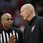 
              Louisville head coach Chris Mack argues a call with referee Jeffrey Anderson during the second half of an NCAA college basketball game in Louisville, Ky., Wednesday, Jan. 5, 2022. Louisville won 75-72. There were 6 technical fouls called in the game. (AP Photo/Timothy D. Easley)
            