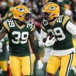 
              Green Bay Packers' Rasul Douglas celebrates his interception with teammates during the second half of an NFL football game against the Cleveland Browns Saturday, Dec. 25, 2021, in Green Bay, Wis. The Packers won 24-22. (AP Photo/Morry Gash)
            