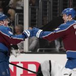 
              Colorado Avalanche right wing Mikko Rantanen, right, celebrates his goal with defenseman Cale Makar during the first period of an NHL hockey game Thursday, Jan. 20, 2022, in Los Angeles. (AP Photo/Mark J. Terrill)
            