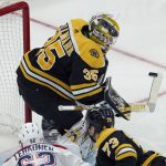 
              Boston Bruins goaltender Linus Ullmark (35) makes a stick save during the first period of an NHL hockey game against the Montreal Canadiens, Wednesday, Jan. 12, 2022, in Boston. (AP Photo/Mary Schwalm)
            