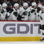 
              San Jose Sharks center Noah Gregor (73) is congratulated by teammates after scoring a goal against the Washington Capitals during the first period of an NHL hockey game, Wednesday, Jan. 26, 2022, in Washington. (AP Photo/Evan Vucci)
            