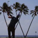 
              Roger Slone plays his approach shot from the 16th fairway during the first round of the Sony Open golf tournament, Thursday, Jan. 13, 2022, at Waialae Country Club in Honolulu. (AP Photo/Matt York)
            