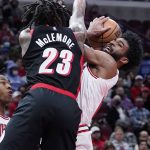 
              Chicago Bulls guard Coby White, right, drives to the basket against Portland Trail Blazers guard Ben McLemore (23) during the second half of an NBA basketball game in Chicago, Sunday, Jan. 30, 2022. (AP Photo/Nam Y. Huh)
            