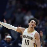 
              New Orleans Pelicans center Jaxson Hayes (10) celebrates after making a 3-point shot in the second half of an NBA basketball game against the Los Angeles Clippers in New Orleans, Thursday, Jan. 13, 2022. The Pelicans won 113-89. (AP Photo/Gerald Herbert)
            