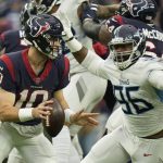 
              Houston Texans quarterback Davis Mills (10) is pressured by Tennessee Titans defensive end Denico Autry (96) during the second half of an NFL football game, Sunday, Jan. 9, 2022, in Houston. (AP Photo/Eric Christian Smith)
            