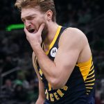 
              Indiana Pacers forward Domantas Sabonis reacts after taking a hit to the face during the second half of an NBA basketball game against the Boston Celtics, Monday, Jan. 10, 2022, in Boston. (AP Photo/Charles Krupa)
            