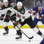 
              Arizona Coyotes center Liam O'Brien (38) skates with the puck during the first period of an NHL hockey game against the New York Islanders, Friday, Jan. 21, 2022, in Elmont, N.Y. (AP Photo/Corey Sipkin).
            