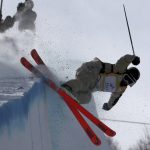 
              FILE - Silver medalist Aaron Blunck of the United States competes during the Men's Freeski Halfpipe event at the FIS Freeski World Cup in Chongli county near Zhangjiakou in northern China's Hebei province on Saturday, Dec. 21, 2019. In a crash a year ago, Blunk landed on the lip of the halfpipe and lacerated his kidney, broke ribs, fractured his pelvis and bruised his heart. While down in the halfpipe and waiting for a helicopter to take him to the hospital, he told his coach: "Please don't let me die." He's now a medal contender. (AP Photo/Ng Han Guan, File)
            
