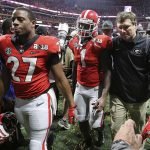 
              FILE - Georgia's Nick Chubb, from left, Sony Michel and Kirby Smart walk off the field as Georgia loses to Alabama in the NCAA college football playoff championship game in Atlanta on Monday, Jan. 8, 2018. Alabama won, 26-23. Those Georgia Bulldogs aren't the only ones having a devil of a time beating fellow Southeastern Conference powerhouse Alabama. (Curtis Compton/Atlanta Journal-Constitution via AP, File)
            