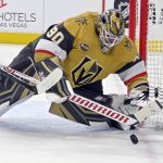 
              Vegas Golden Knights goaltender Robin Lehner (90) makes a save against the Chicago Blackhawks during the first period of an NHL hockey game Saturday, Jan. 8, 2022, in Las Vegas. (AP Photo/David Becker)
            